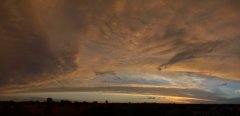 Panorama sunset sky with sliver of blue sky.